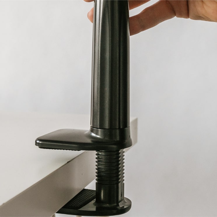 Attach the tripod to the table